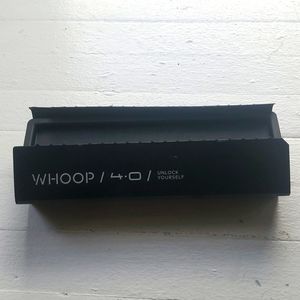 Whoop Wristband and Charging Cube